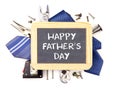 Happy Fathers Day chalkboard with underlying frame of tools and ties isolated on white