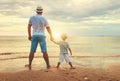 Happy fathers day. family dad and child son at beach Royalty Free Stock Photo