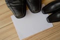 Happy fathers day, fathers shoes and baby boys shoes overhead, flat lay Royalty Free Stock Photo