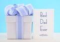 Happy Fathers Day Gift with Blue and White Ribbon Royalty Free Stock Photo