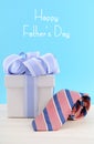 Happy Fathers Day Gift with Blue and White Ribbon Royalty Free Stock Photo