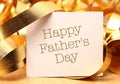 Happy fathers day with gold decoration.