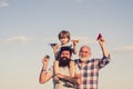 Happy fathers day. Happy three generations of men have fun and smiling on blue sky background. Grandfather playtime