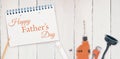 Happy fathers day message next to tools
