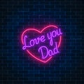 Happy Fathers Day neon glowing festive sign on a dark brick wall background. Love you dad in heart shape.