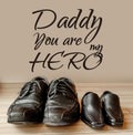 Happy fathers day, fathers shoes and baby boys shoes overhead, flat lay Royalty Free Stock Photo