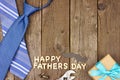 Happy Fathers Day wood letters with tools and ties on rustic wood Royalty Free Stock Photo