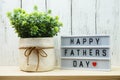 Happy Fathers Day word on light box on wooden background Royalty Free Stock Photo