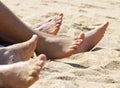 Happy feet on sand beach