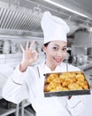 Happy baker with croissants Royalty Free Stock Photo