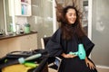 Happy female customer using hairdryer, hairsalon Royalty Free Stock Photo