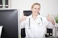 Happy Female Doctor Showing Two Thumbs Up Royalty Free Stock Photo