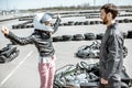 Woman with instructor on the go-kart track Royalty Free Stock Photo