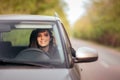 Happy Female Driver on a Summer Vacation Road Trip Royalty Free Stock Photo