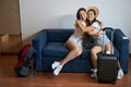 Happy female friends hugging into the hotel room Royalty Free Stock Photo