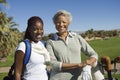 Happy Female Golfers At Golf Course Royalty Free Stock Photo