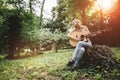 Happy female guitar player Royalty Free Stock Photo