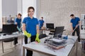 Happy Female Janitor In Office Royalty Free Stock Photo