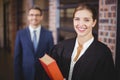 Happy female lawyer with businessman Royalty Free Stock Photo