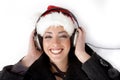 Happy female listening music and wearing christmas Royalty Free Stock Photo