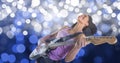 Happy female music artist playing guitar over bokeh