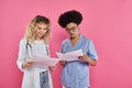 happy female oncologists, interracial doctors on Royalty Free Stock Photo