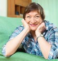 Happy female pensioner with checkered blouse Royalty Free Stock Photo