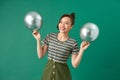 Happy female with smiling, having fun with two silver ballons Royalty Free Stock Photo