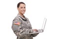 Happy female soldier using laptop Royalty Free Stock Photo
