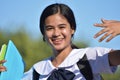 A Happy Female Student Holding Books Royalty Free Stock Photo