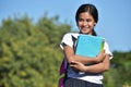 A Happy Female Student Holding Books Royalty Free Stock Photo