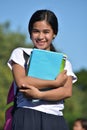 A Happy Female Student Holding Books Royalty Free Stock Photo