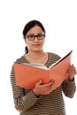 Happy female student holding text book Royalty Free Stock Photo