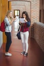 Happy female students looking at results Royalty Free Stock Photo