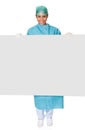 Happy Female Surgeon Holding Placard Royalty Free Stock Photo