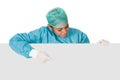 Happy Female Surgeon Holding Placard Royalty Free Stock Photo