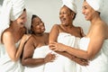 Happy females with different age and body size having skin care spa day