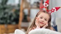 Happy festive child face playing laughing relaxing at cosiness home have fun enjoy Xmas mood