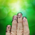 Happy finger family on green nature background