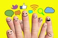 Happy finger smileys with social network sign.