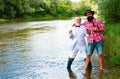 Happy fishermen. Active sunny day. Fishing excuse drinking. Big game fishing. Man fisherman catches a fish. Set up rod Royalty Free Stock Photo