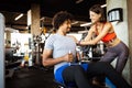 Happy fit friends exercising, working out in gym to stay healthy together Royalty Free Stock Photo