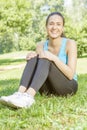 Happy fitness girl relaxing Royalty Free Stock Photo