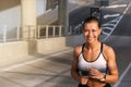 Fitness sporty woman running early in the morning city at sunrise. Healthy lifestyle concept Royalty Free Stock Photo