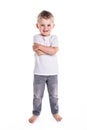 Happy five year old European boy posing over white studio background Royalty Free Stock Photo