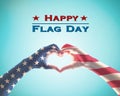 Happy flag day holiday with American flag pattern on people hands in heart shaped Royalty Free Stock Photo