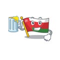 Happy flag oman holding a glass With juice