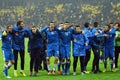 Happy football players celebrate qualifying to FIFA World Cup 2014