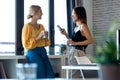 Happy freelance business women seller taking a break while talking in her startup small business Royalty Free Stock Photo