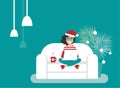 Happy freelancer girl with santa hat on sofa with laptop. creative hipster work at home.